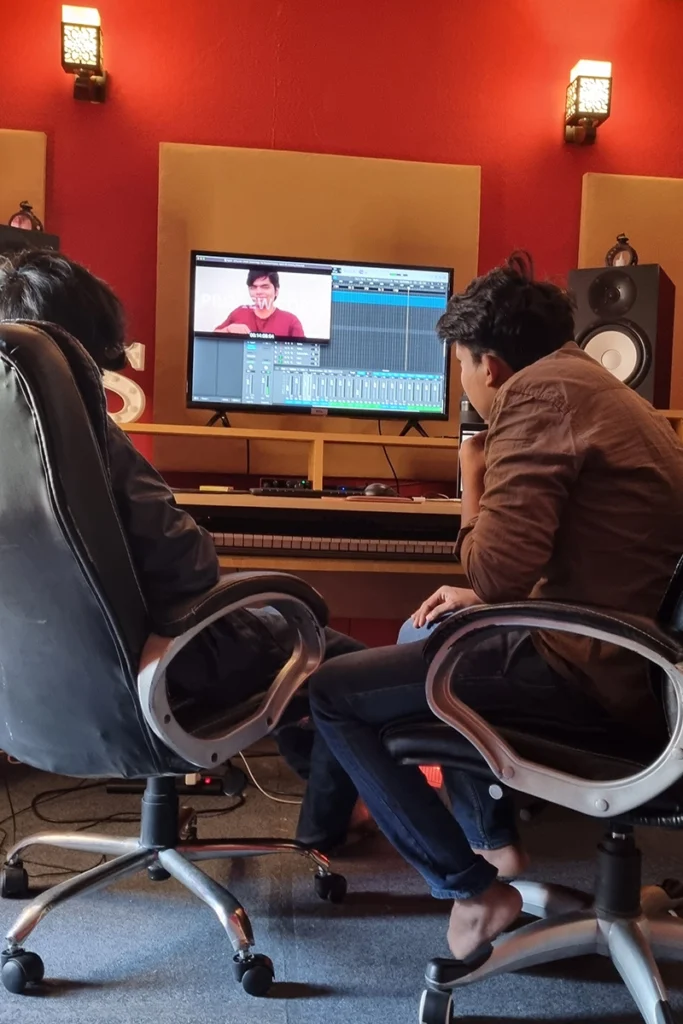 Shivam Gupta with Music Producer During Mixing and Mastering Sessions in Studio for Anant: A Journey Towards the End by Spark VFX Studios